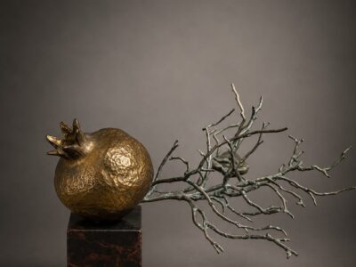 Golden Pomegranate on a branch